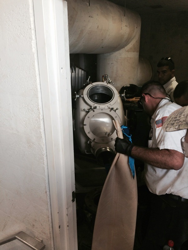 plumber performing CIPP trenchless sewer line repairs