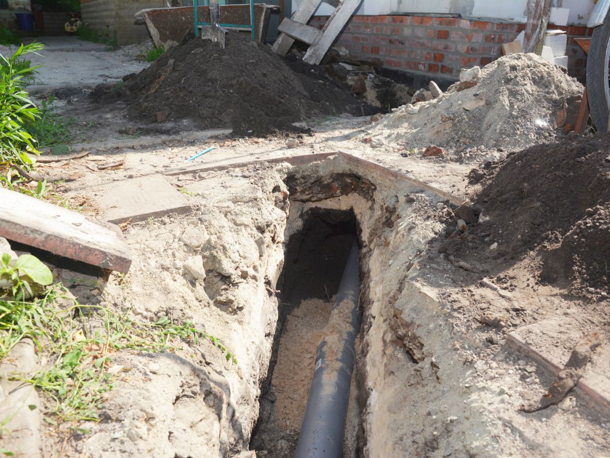 evacuation done by plumbers to fix sewer line belly
